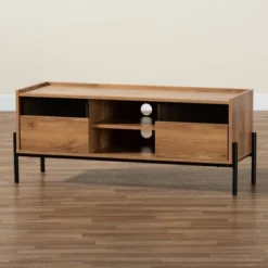 Tasman Wood And Metal 2 Door TV Stand For TVs Up To 45" Natural Brown/Black - Baxton Studio 16 Tasman Wood And Metal 2 Door TV Stand For TVs Up To 45" Natural Brown/Black - Baxton Studio -Furniture Haven Shop GUEST 826d49df f57a 4e09 ac6f 8ebfb0d25646