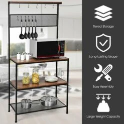 Costway 4-Tier Kitchen Bakers Rack Microwave Oven Stand Industrial W/Hooks & Mesh Panel -Furniture Haven Shop GUEST 96ef8627 557a 47f9 8f14 9ecfa1ee8faf