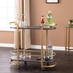 Lyflon Rolling Bar Cart Black/Gold - Aiden Lane 11 Lyflon Rolling Bar Cart Black/Gold - Aiden Lane -Furniture Haven Shop GUEST a0494f02 adb6 4ed0 9df9 59c78a15b598